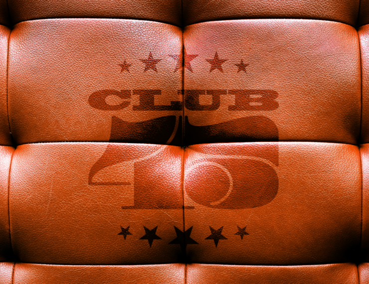 Brown leather sofa embossed with Club45 logo, the club for record collectors, merch and music lovers
