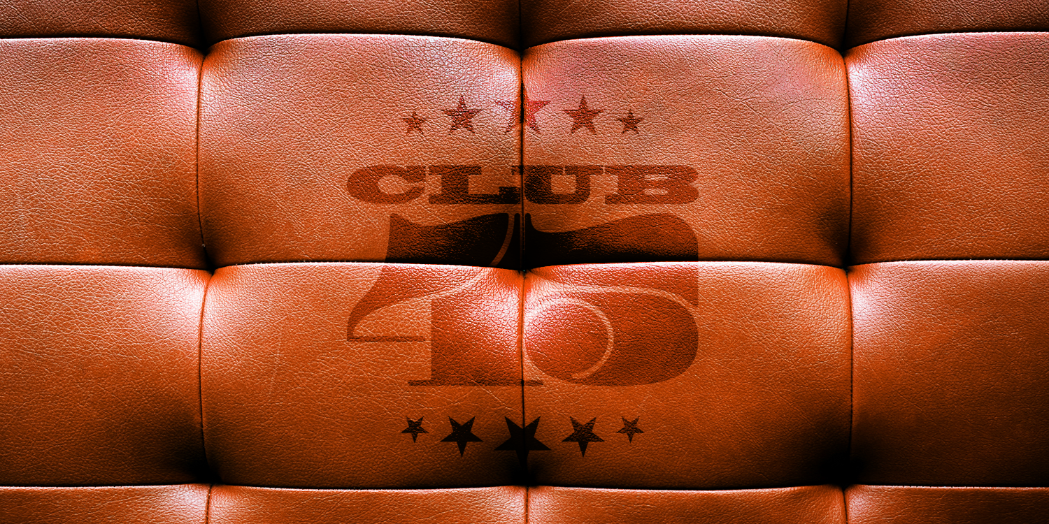 Brown leather sofa embossed with Club45 logo, the club for record collectors, merch and music lovers
